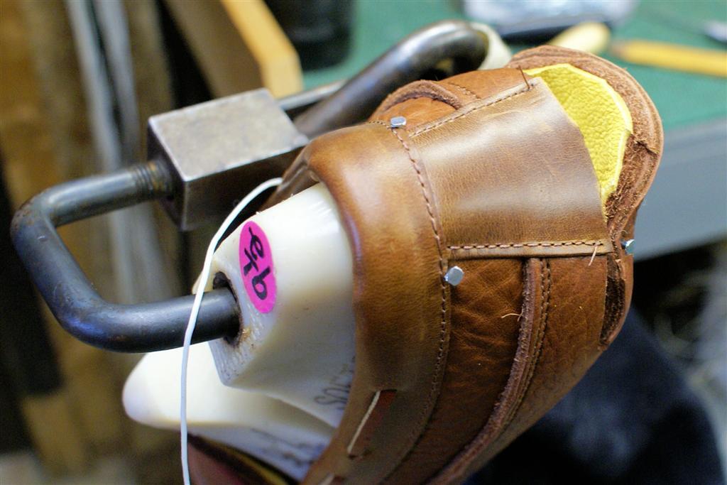 handsewing-the-heel-5924320318-l.jpg